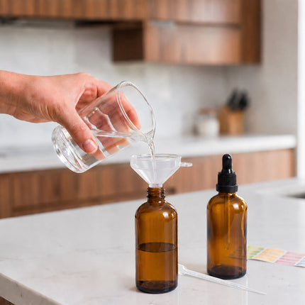 Dzintara krāsas stikla pudelītes ar pilinātāju, 100 ml, 12 pudelīšu komplekts