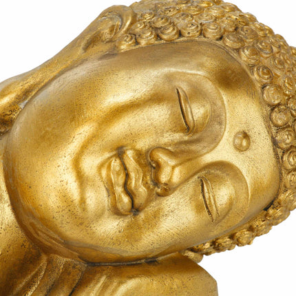 Budas statuja ar galvu uz ceļiem