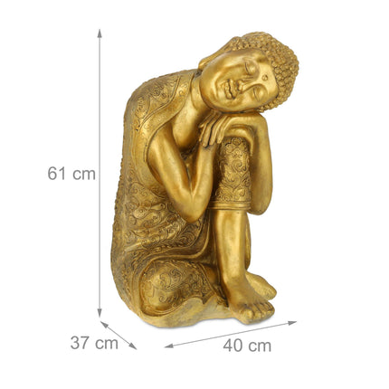 Budas statuja ar galvu uz ceļiem
