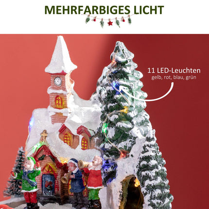 Christmas village with LED lights and moving train
