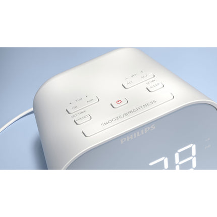 Clock radio with mirror-finish front. Digital FM receiver. USB output for mobile charging