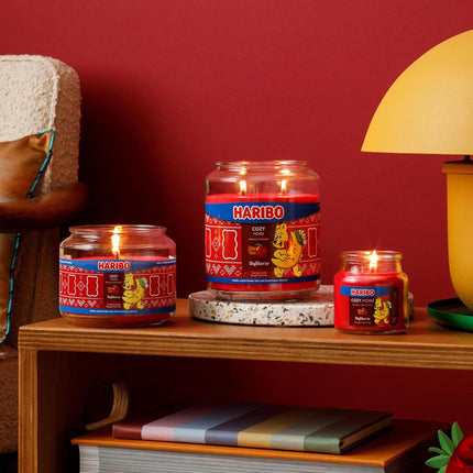 Aromātiskā svece lielā stikla burkā - salds aromāts