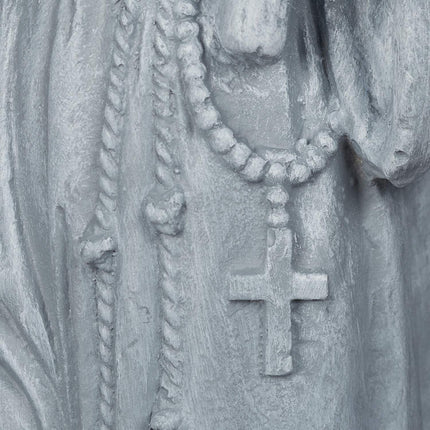 Reliģiska dārza statuja