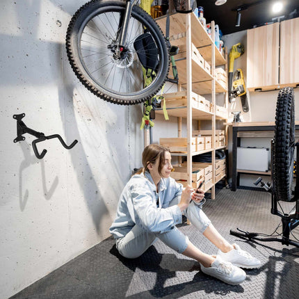 Sienas stiprinājums saliekamajam velosipēdam